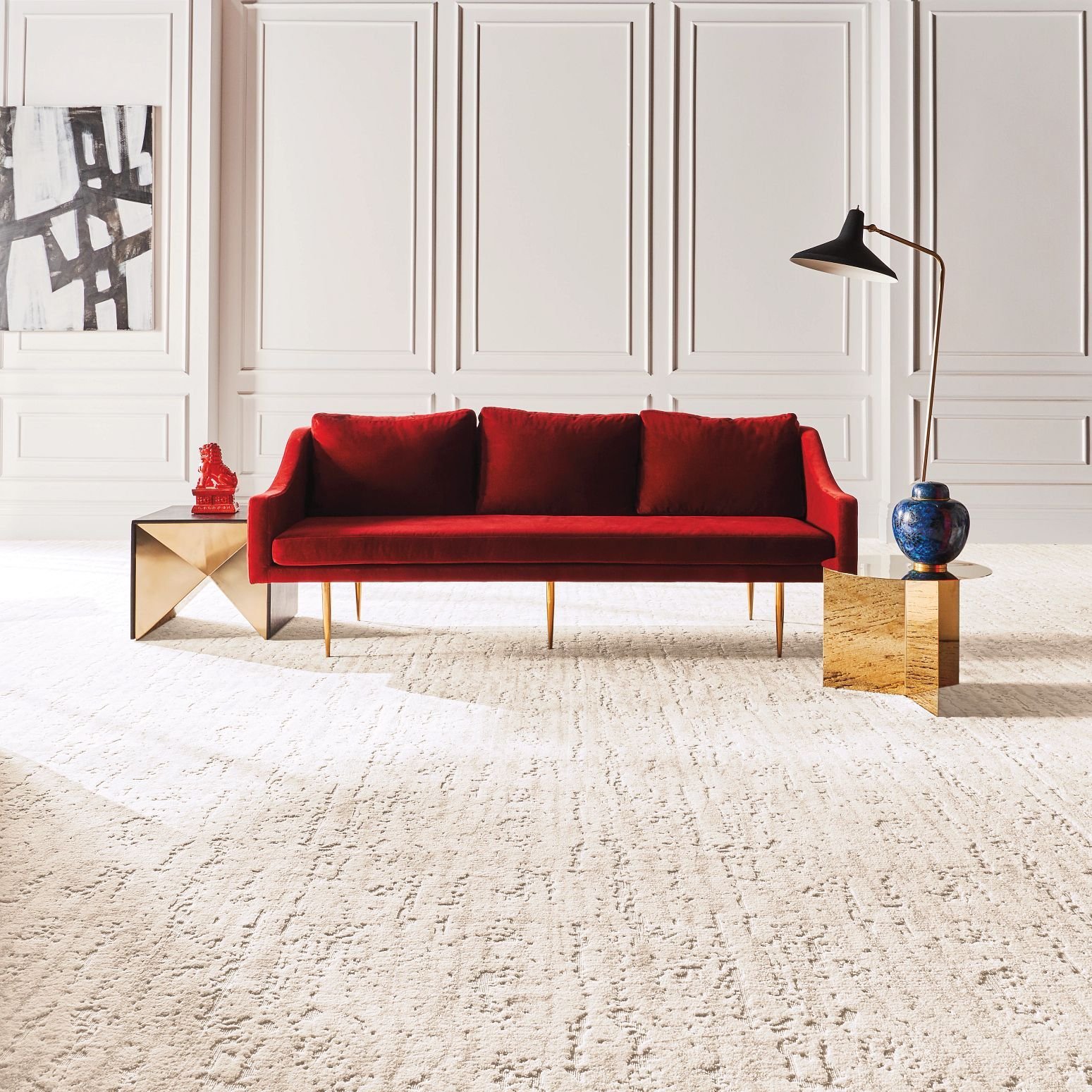 Red sofa on beige carpet from Carpet Studio & Design Inc. in Los Angeles, CA