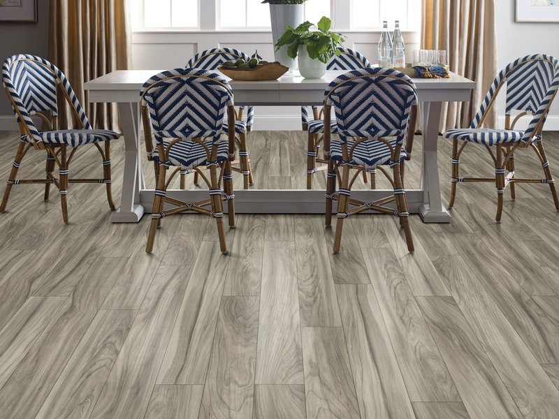 Dining room with wood-look laminate flooring from Carpet Sudio & Design Inc. in Los Angeles, CA