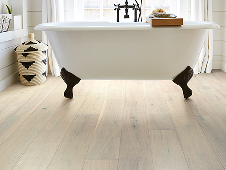 Bathroom with wood-look luxury vinyl flooring from Carpet Sudio & Design Inc. in Los Angeles, CA